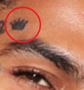 Rolex Crown Tattoo Above Eyebrow .